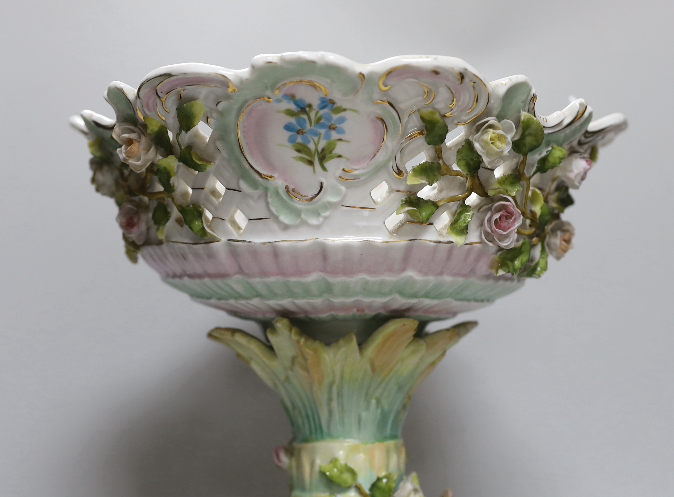 A Sitzendorf putti table centrepiece, 43cm high